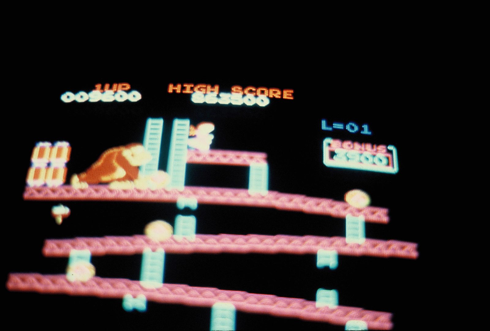 Photo of a Donkey Kong arcade screen taken in 1982, with HIGH SCORE 863500 at the top and Donkey Kong on the girders below